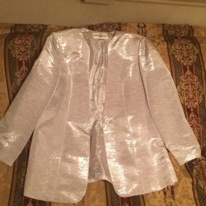 3 pc silver suit with designs in the tail
